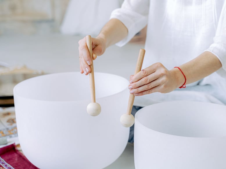 Crystal singing bowls arranged for a sound bath